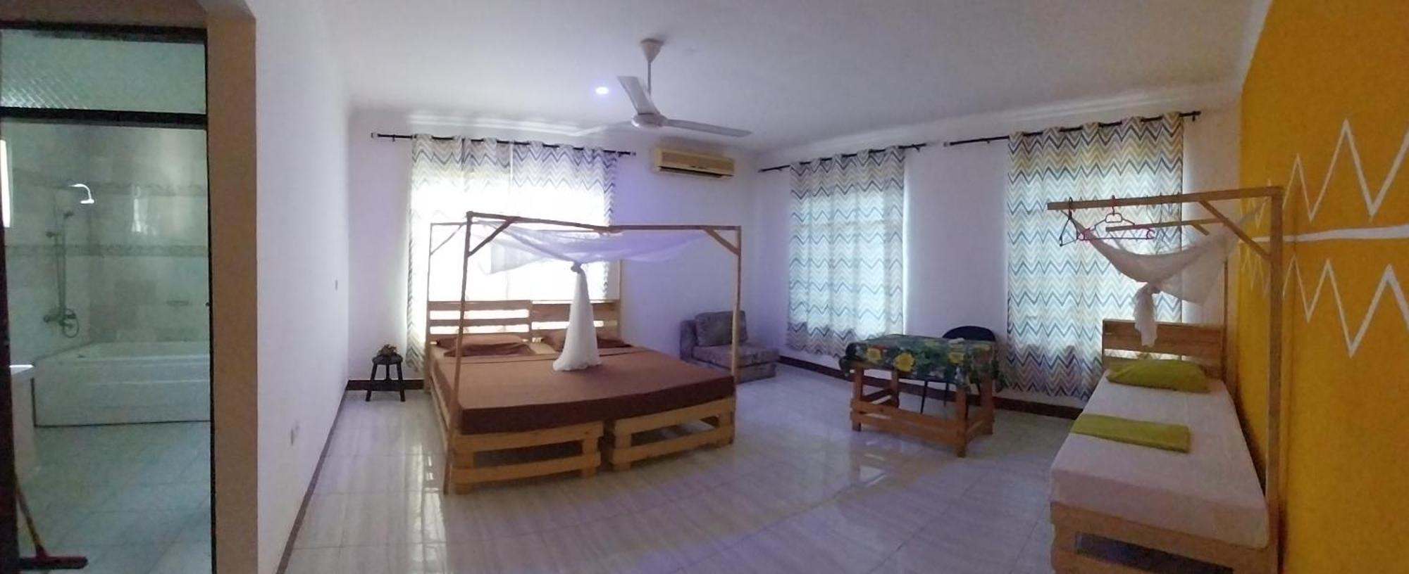 L&J Modern Backpackers Kigamboni Beach House Bed & Breakfast Dar es Salaam Exterior photo